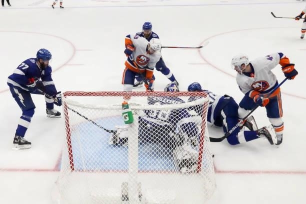 Andrei Vasilevskiy of the Tampa Bay Lightning makes the save against against Jean-Gabriel Pageau of the New York Islanders during the second period...