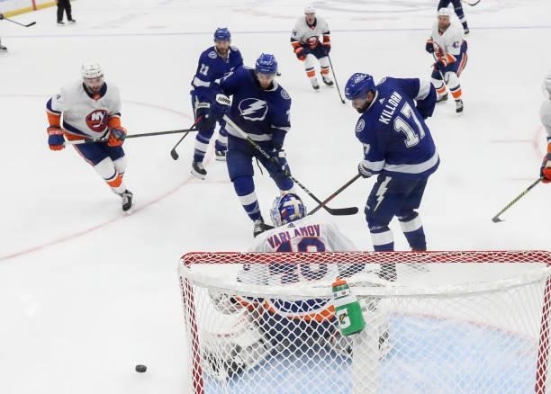 Semyon Varlamov of the New York Islanders makes the save against Alex Killorn of the Tampa Bay Lightning during the third period in Game One of the...