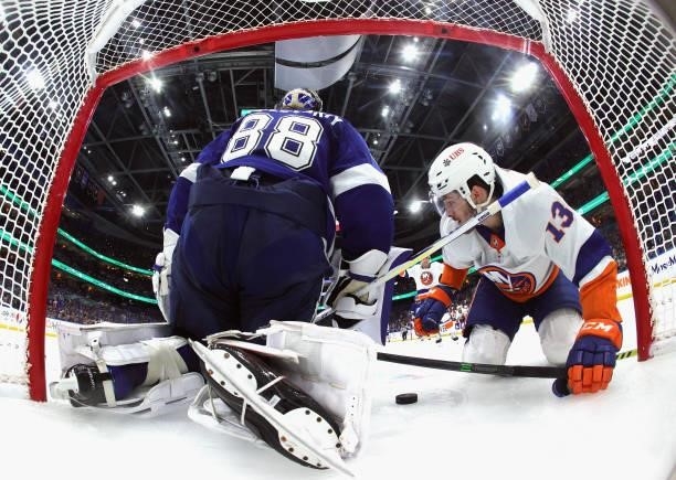 Mathew Barzal of the New York Islanders scores a goal against Andrei Vasilevskiy of the Tampa Bay Lightning during the second period in Game One of...