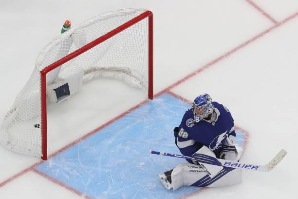 Andrei Vasilevskiy of the Tampa Bay Lightning allows a goal to Ryan Pulock of the New York Islanders during the third period in Game One of the...