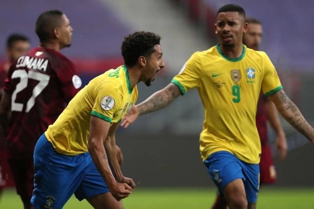 Marquinhos of Brazil celebrates with teammate Gabriel Jesus after scoring the first goal of his team during a Group B match between Brazil and...