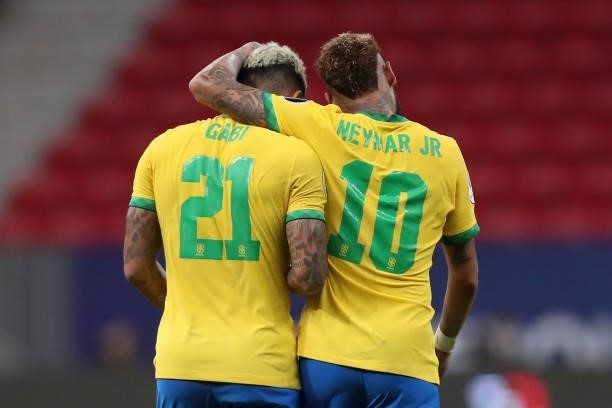 Gabriel Barbosa of Brazil celebrates with teammate Neymar Jr. After scoring the third goal of his team during a Group B match between Brazil and...