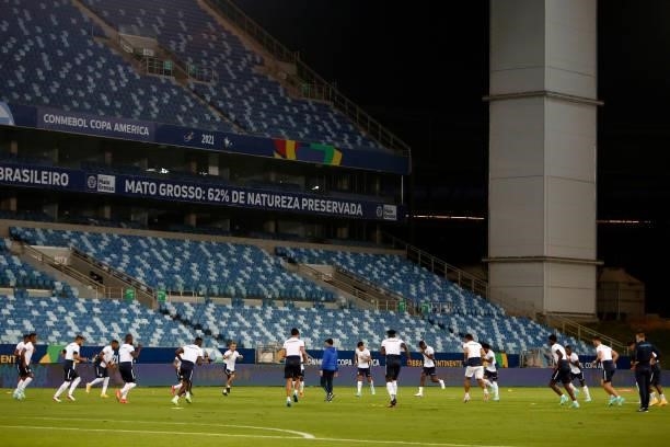 Players of Ecuador warm up before Group B match between Ecuador and Colombia at Arena Pantanal on June 13, 2021 in Cuiaba, Brazil.