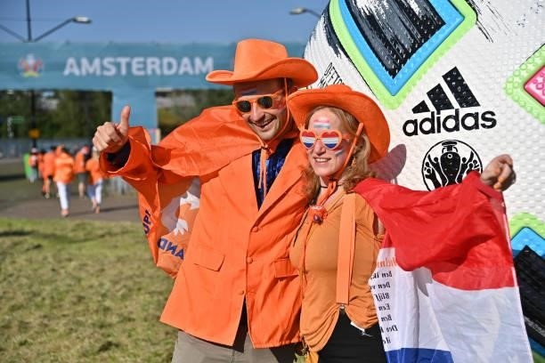 Fans of Netherlands pose near a Adidas Uniforia official ball installation prior the UEFA Euro 2020 Championship Group C match between Netherlands...