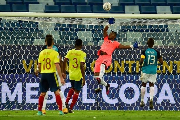Pedro Ortiz goalkeeper of Ecuador makes a save during a Group B match between Ecuador and Colombia at Arena Pantanal on June 13, 2021 in Cuiaba,...