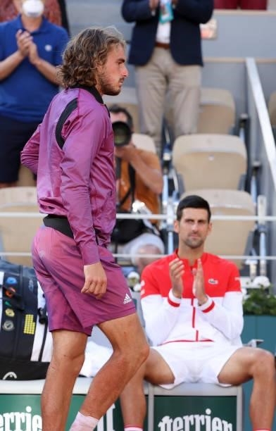 Finalist Stefanos Tsitsipas of Greece, winner Novak Djokovic of Serbia during the trophy ceremony for the Men's Singles final on day 15 of the French...