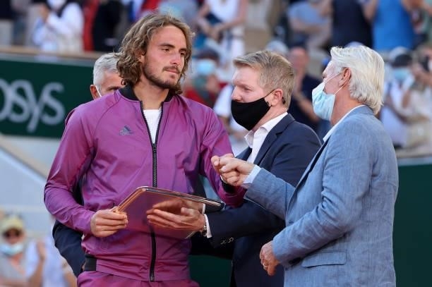 Finalist Stefanos Tsitsipas of Greece, Jim Courier, Bjorn Borg during the trophy ceremony for the Men's Singles final on day 15 of the French Open...