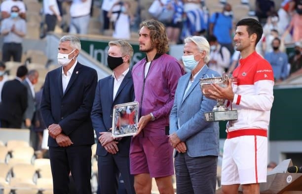 From left, President of French Tennis Federation FFT Gilles Moretton, Jim Courier, finalist Stefanos Tsitsipas of Greece, Bjorn Borg, winner Novak...