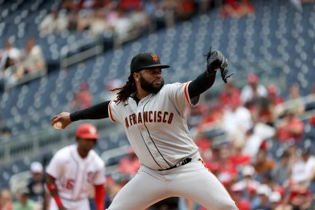 Starting pitcher Johnny Cueto of the San Francisco Giants throws to a Washington Nationals batter at Nationals Park on June 13, 2021 in Washington,...
