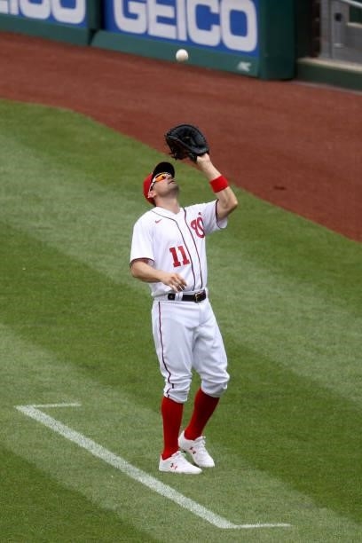 Ryan Zimmerman of the Washington Nationals makes a catch in foul territory against the San Francisco Giants at Nationals Park on June 13, 2021 in...