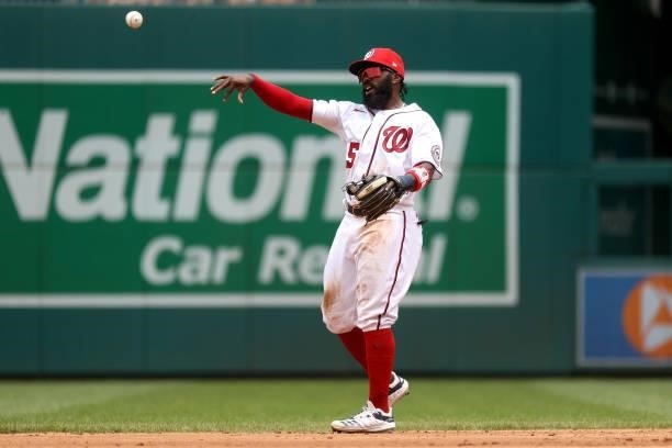 Josh Harrison of the Washington Nationals throws the ball against the San Francisco Giants at Nationals Park on June 13, 2021 in Washington, DC.