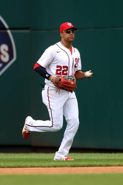 Juan Soto of the Washington Nationals runs the ball in after making a catch against the San Francisco Giants at Nationals Park on June 13, 2021 in...