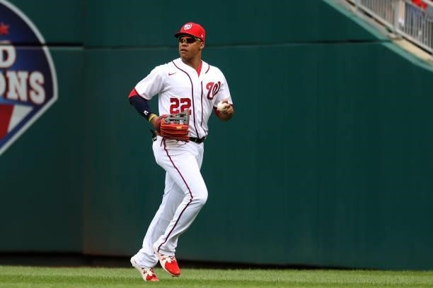 Juan Soto of the Washington Nationals runs the ball in after making a catch against the San Francisco Giants at Nationals Park on June 13, 2021 in...