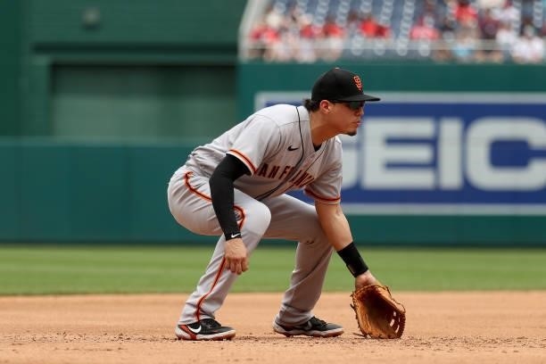 Wilmer Flores of the San Francisco Giants looks on against the Washington Nationals at Nationals Park on June 13, 2021 in Washington, DC.