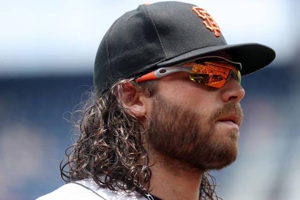 Brandon Crawford of the San Francisco Giants comes off the field against the Washington Nationals at Nationals Park on June 13, 2021 in Washington,...