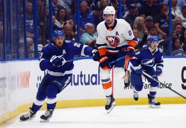 Brock Nelson of the New York Islanders skates against Ryan McDonagh of the Tampa Bay Lightning in Game One of the Stanley Cup Semifinals during the...