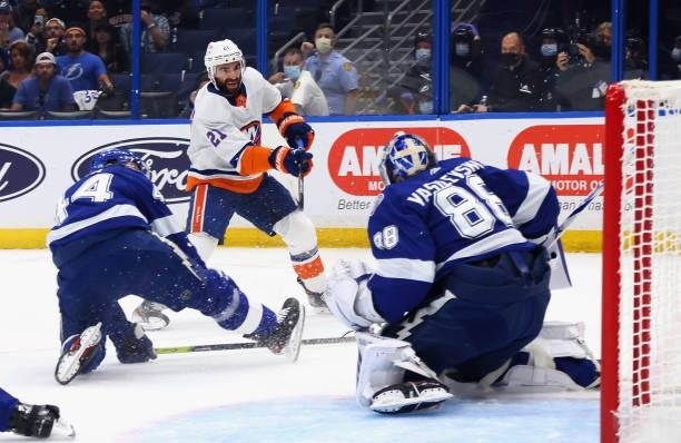 Kyle Palmieri of the New York Islanders takes the shot against the Tampa Bay Lightning in Game One of the Stanley Cup Semifinals during the 2021...