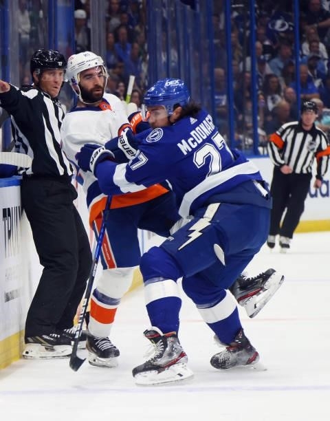 Kyle Palmieri is checked by Ryan McDonagh of the Tampa Bay Lightning in Game One of the Stanley Cup Semifinals during the 2021 Stanley Cup Playoffs...