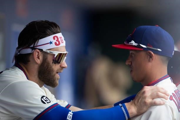 Bryce Harper of the Philadelphia Phillies talks to Ronald Torreyes prior to the game against the New York Yankees at Citizens Bank Park on June 13,...