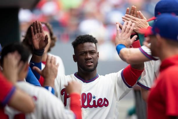 Odubel Herrera of the Philadelphia Phillies high fives his teammates against the New York Yankees at Citizens Bank Park on June 13, 2021 in...
