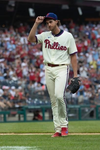 Aaron Nola of the Philadelphia Phillies tips his cap to the crowd after being removed from the game in the top of the eighth inning against the New...