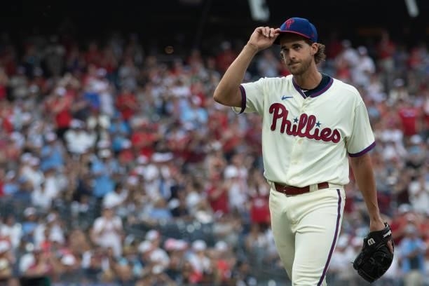 Aaron Nola of the Philadelphia Phillies tips his cap to the crowd after being removed from the game in the top of the eighth inning against the New...