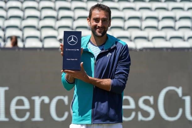 Marin Cilic of Croatia poses with trophy after winning the MercedesCup against Felix Auger-Aliassime of Canada during day 7 of the MercedesCup at...