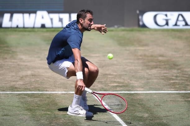 Marin Cilic of Croatia plays a backhand during his final match against Felix Auger-Aliassime of Canada during day 7 of the MercedesCup at Tennisclub...