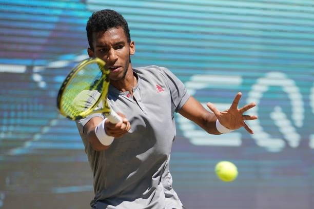 Felix Auger-Aliassime of Canada plays a forehand during his final match against Marin Cilic of Croatia during day 7 of the MercedesCup at Tennisclub...