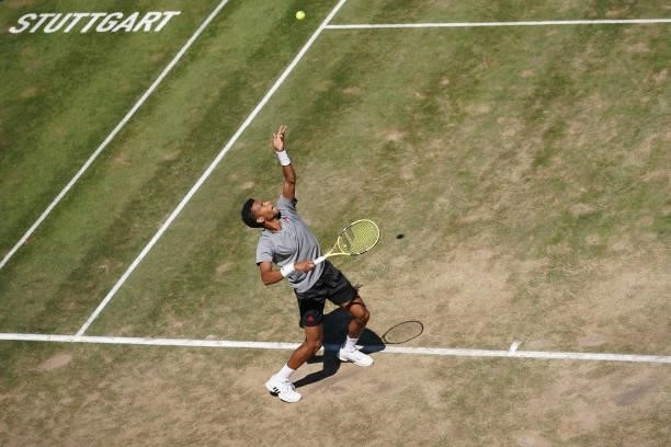 Felix Auger-Aliassime of Canada makes a service during his final match against Marin Cilic of Croatia during day 7 of the MercedesCup at Tennisclub...