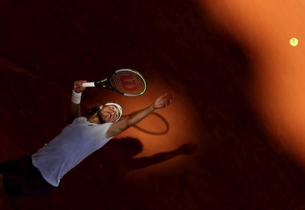 Stefanos Tsitsipas of Greece serves in his Men's Singles Final match against Novak Djokovic of Serbia during Day Fifteen of the 2021 French Open at...