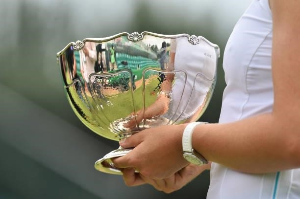 Johanna Konta of Great Britain holds the Viking Open Trophy after she beats Shuai Zhang of China at Nottingham Tennis Centre on June 13, 2021 in...