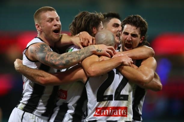 Steele Sidebottom of the Magpies celebrates kicking a goal during the round 13 AFL match between the Melbourne Demons and the Collingwood Magpies at...