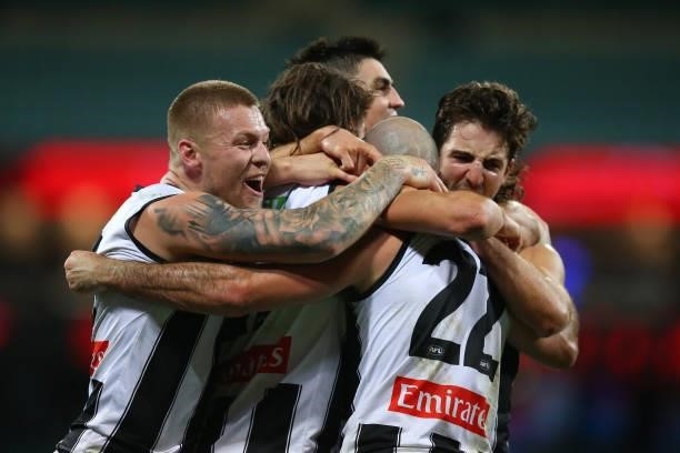Steele Sidebottom of the Magpies celebrates kicking a goal during the round 13 AFL match between the Melbourne Demons and the Collingwood Magpies at...