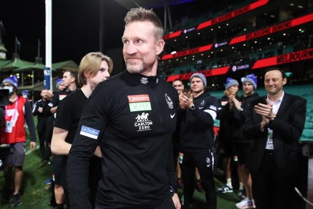 Magpies head coach Nathan Buckley celebrates victory after coaching his final game for the Magpies during the round 13 AFL match between the...