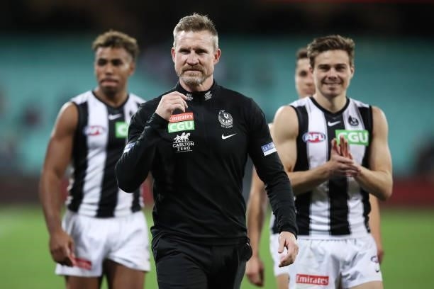 Magpies head coach Nathan Buckley celebrates victory after coaching his final match for the Magpies during the round 13 AFL match between the...