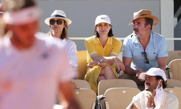 Nadia Fares, Nathalie Pechalat and husband Jean Dujardin watching Stefanos Tsitsipas of Greece during the Men's Singles Final during day 15 of the...