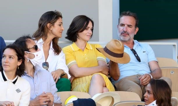 Nadia Fares, Nathalie Pechalat and husband Jean Dujardin attend the Men's Singles Final during day 15 of the 2021 Roland-Garros, French Open, a Grand...