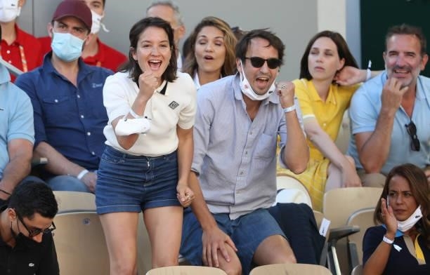 Anais Demoustier cheers for Stefanos Tsitsipas of Greece during the Men's Singles Final during day 15 of the 2021 Roland-Garros, French Open, a Grand...