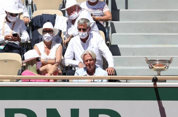 Bjorn Borg has his picture taken by his wife Patricia Ostfeldt, above President of French Tennis Federation FFT Gilles Moretton and his wife during...