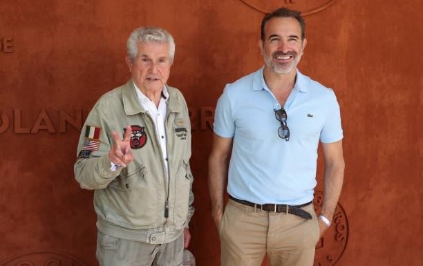 Claude Lelouch, Jean Dujardin attend the Men's Singles Final during day 15 of the 2021 Roland-Garros, French Open, a Grand Slam tennis tournament at...