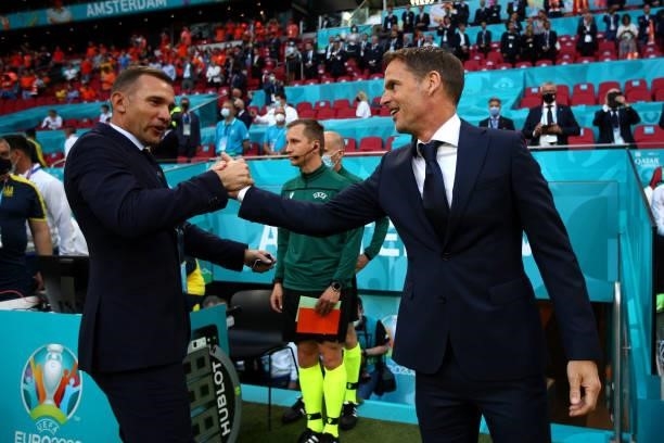 Head Coach, Frank de Boer of Netherlands shakes hands with Head Coach Andriy Shevchenko of Ukraine during the UEFA Euro 2020 Championship Group C...
