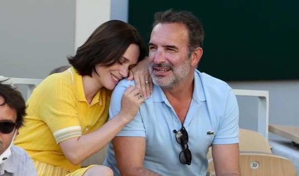 Jean Dujardin and his wife Nathalie Pechalat attend the Men's Singles Final during day 15 of the 2021 Roland-Garros, French Open, a Grand Slam tennis...