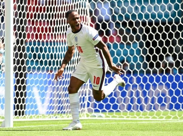Raheem Sterling of England celebrates after scoring their side's first goal during the UEFA Euro 2020 Championship Group D match between England and...
