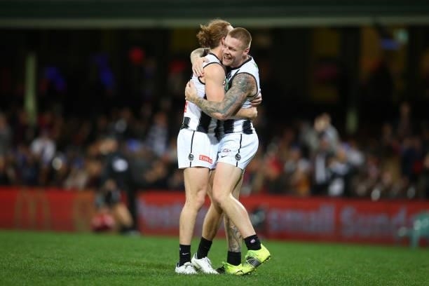 Jordan De Goey of the Magpies celebrates victory during the round 13 AFL match between the Melbourne Demons and the Collingwood Magpies at Sydney...