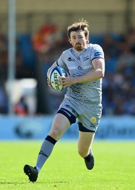 MacGinty of Sale Sharks makes a break during the Gallagher Premiership Rugby match between Exeter Chiefs and Sale at Sandy Park on June 12, 2021 in...