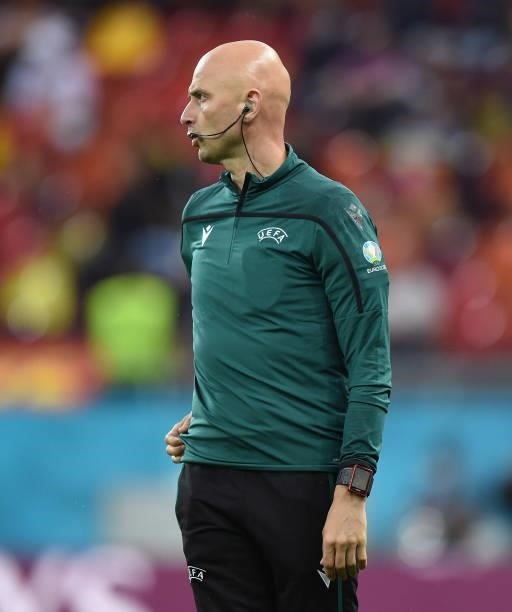 Fourth Official, Sergei Karasev looks on during the UEFA Euro 2020 Championship Group C match between Austria and North Macedonia on June 13, 2021 in...