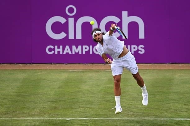Feliciano Lopez of Spain serves in his First Round match against Illya Marchenko of Ukraine during Day 1 of the cinch Championships at The Queen's...