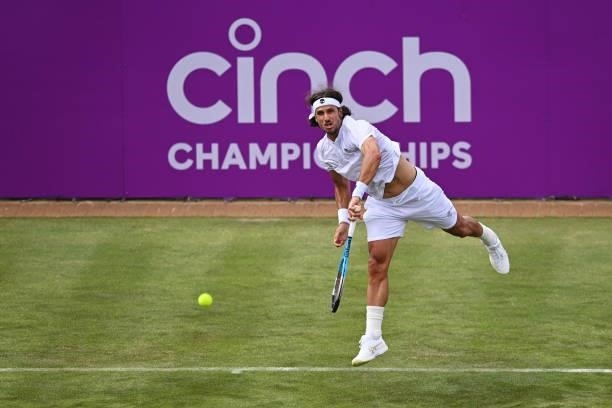 Feliciano Lopez of Spain serves in his First Round match against Illya Marchenko of Ukraine during Day 1 of the cinch Championships at The Queen's...
