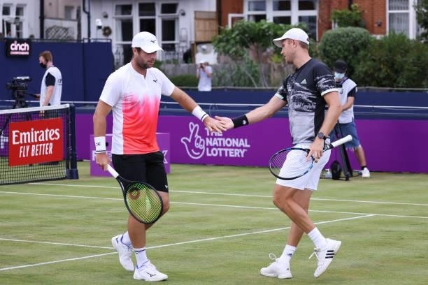 Luke Bambridge and Dominic Inglot of Great Britain celebrate in their First Round Doubles match against James Ward and Stuart Parker of Great Britain...